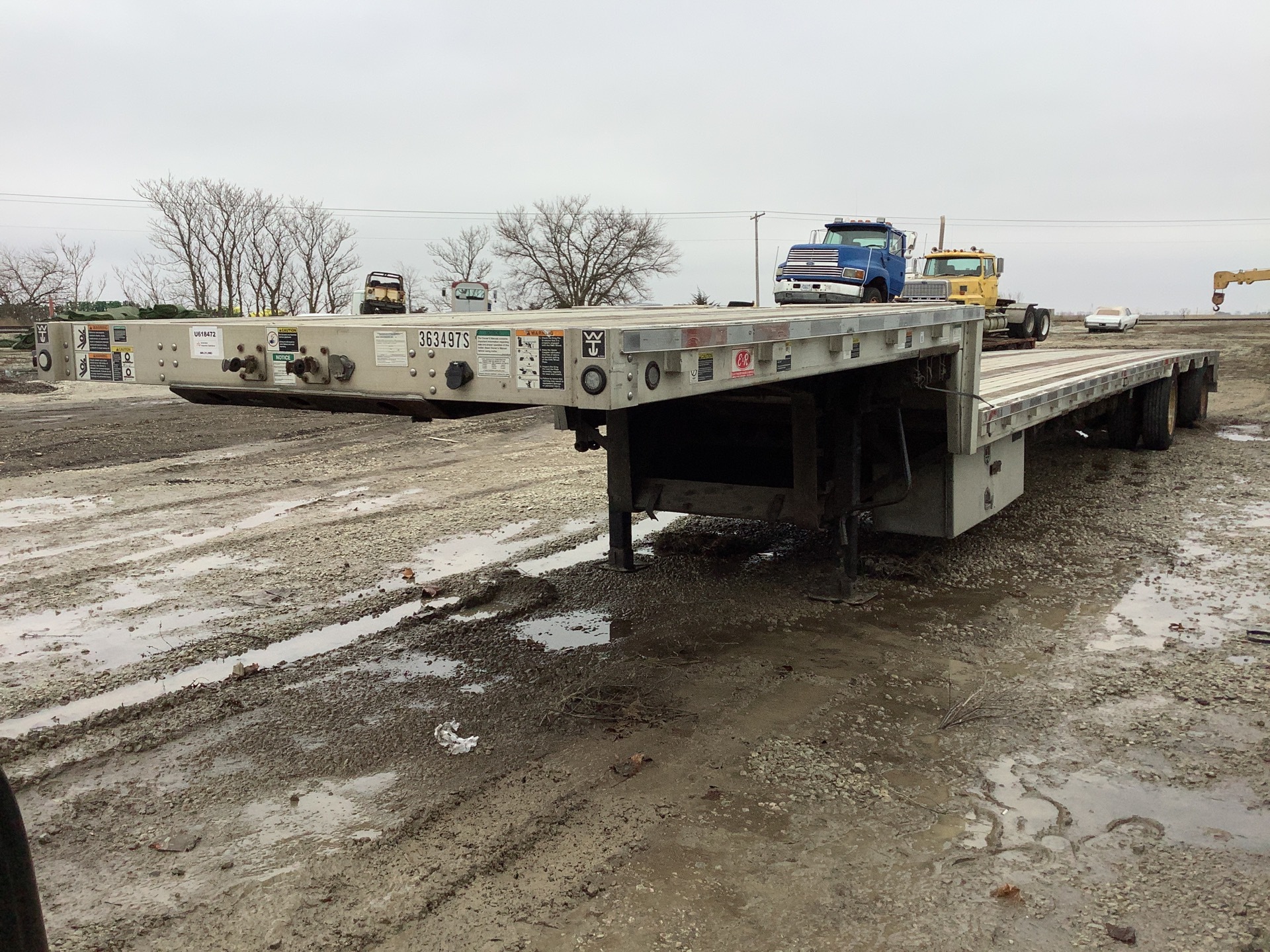 2009 Wilson CFD-900 T/A Step Deck Trailer